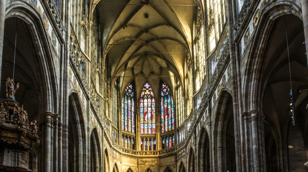 inside a gothic cathedral inside a gothic cathedral with stained glass